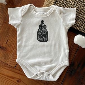 “I’ll have a bottle of the house white” cream onesie by Finn+Emma